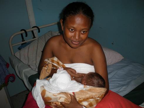 21-year old new mum Stella Pitu with her son three days after an emergency caesarean performed by Fred Hollows NZ-trained eye doctors
