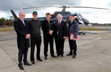 Transport minister Steven Joyce, Far North Mayor Wayne Brown, Salt Air managing director Grant Harnish, district councillor Tom Baker and council chief executive David Edmunds at Bay of Islands Airport before departing on the aerial tour.