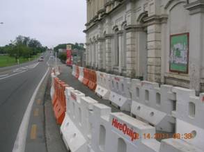 Pedestrian barrier erected to provide a safe passage for the public.