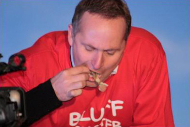 Prime Minister John Key contests the Celebrity Oyster Eating Race at last years Bluff Oyster & Food Festival
