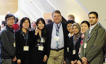 Professor Bill Megginson (center) with Massey University finance PhD students at the FMA Asian conference the University hosted in Queenstown.