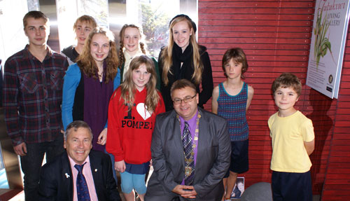 Members of the Wilson family and Hutt City Rotarian Linton Adams, left front, with the Mayor Ray Wallace.