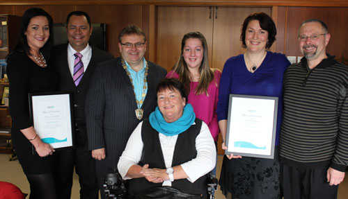 Pictured with their Mayoral citations are the CPR sisters from left Jodie Alexander and Kathy James with their mother in front Mariese Schrader.