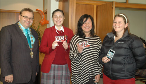 From left: Ngaire Speedy and Grace Perez who won $20 Westfield vouchers and Dalisle Marshall who won the iPod Touch.