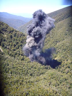 smoke billowing from the vent shaft vertical column after the fourth explosion on Sunday 28 November.