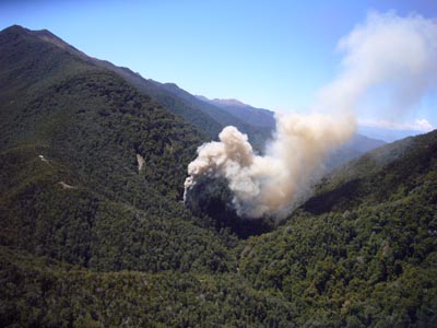 smoke billowing from the vent shaft vertical column after the fourth explosion on Sunday 28 November.
