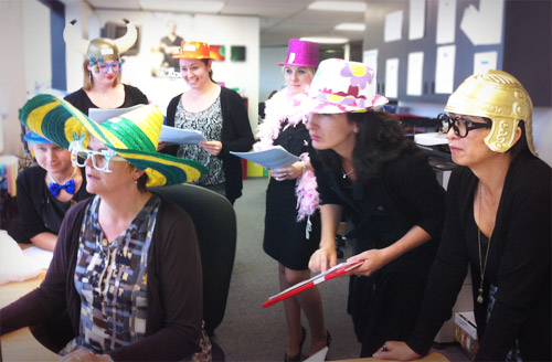 Where did you get that hat? MediaWorks' Finance team gets on with the serious task of testing their new Greentree system.