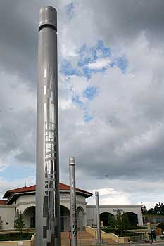 Close-up of one of the seven stainless steel pou.