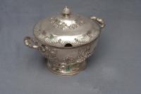 A silver sugar bowl