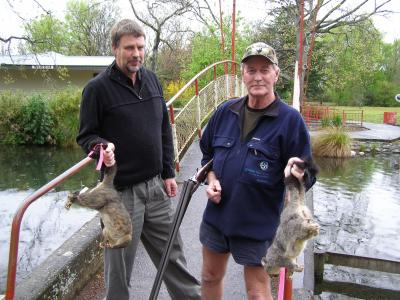 Miniature Train Society member and MDC officer Stephen Simonek and Greater Wellington pest control officer Murry Clark after September's possum cull at Masterton's Queen Elizabeth Park.