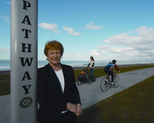 The Mayor standing next to the Rotary Pathway.