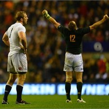 Agony and ecstacy: As Jean de Villiers celebrates, Chris Robshaw cuts a dejected figure as England's hopes of a top-four seeding ended with defeat.