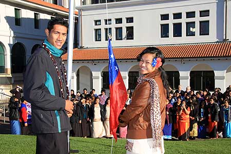 Samoan secondary school students raise the Samoan flag to celebrate Independence Day at the Albany campus.