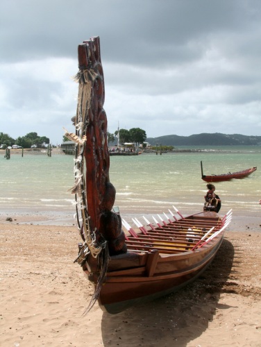 A traditional Maori waka on the beach at Waitangi.